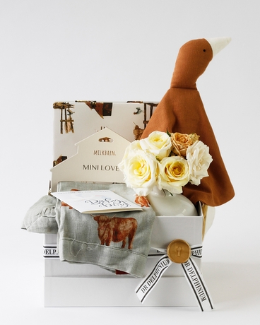 Deluxe size,  inches height and  inches wide.