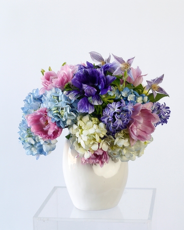 Deluxe size, 11 inches height and 10 inches wide.