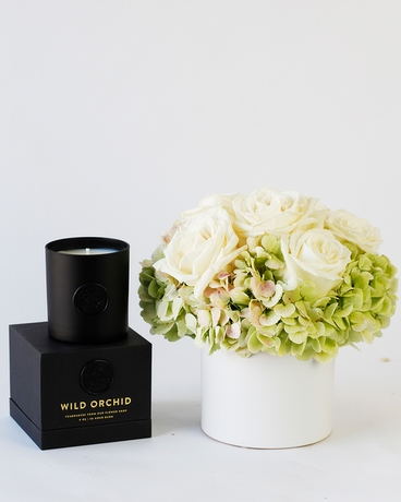 Flowers & Candle size,  inches height and  inches wide.